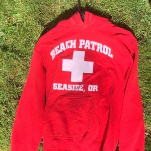 Beach patrol seaside or red hoodie